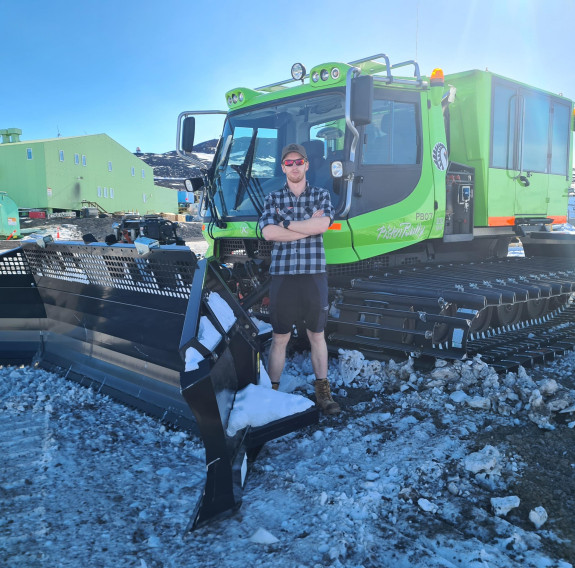 Driving a PistenBully (snow groomer) is among the highlights of an Op Antarctica deployment for NZDF personnel like Lance Corporal Kieran Cropp