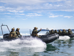 New Zealand Army soldiers operate two inflatable Zodiac boats in Wellington Harbour.