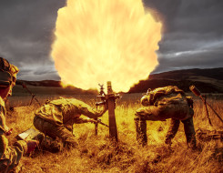 New Zealand Army soldiers fire a 81mm mortar round at dusk. One soldier stands back with looking at a piece of paper in lefthand side of the image. Two soldiers are near the mortar, heads down. Flames are shown coming out of the mortar which create the co