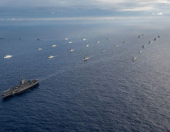 A multinational fleet performs a controlled breakaway during a photo exercise off the coast of Hawaii during the Rim of Pacific Exercise (RIMPAC), July 26 2018 