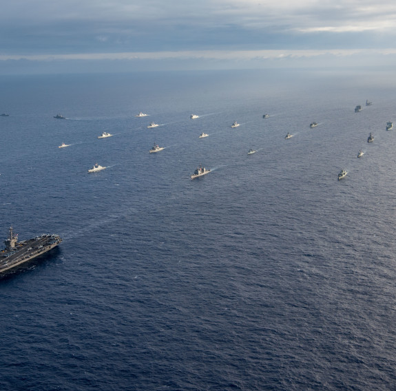 A multinational fleet performs a controlled breakaway during a photo exercise off the coast of Hawaii during the Rim of Pacific Exercise (RIMPAC), July 26 2018 