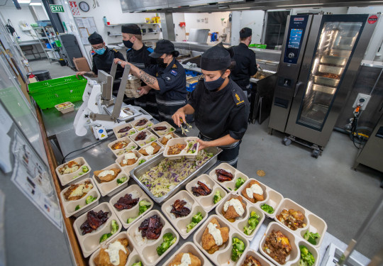 Navy Chefs prepare the lunch service at the Vince McGlone Galley, Devonport Naval Base.