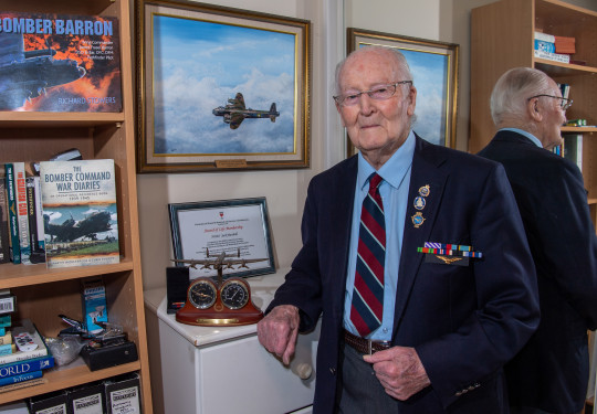 Flying Officer Jack Marshall DFC at his home.