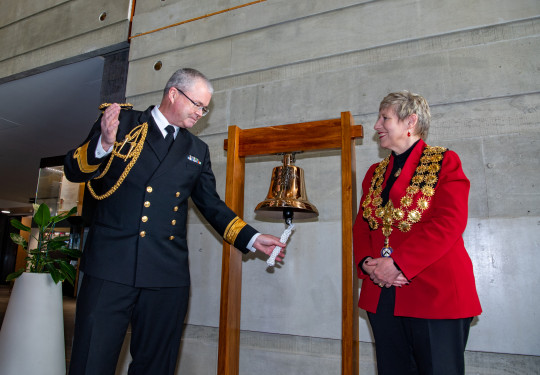 Chief of Navy, Rear Admiral David Proctor presented the bell to Christchurch Mayor, Lianne Dalziel at the city council offices.