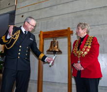 Chief of Navy, Rear Admiral David Proctor presented the bell to Christchurch Mayor, Lianne Dalziel at the city council offices.