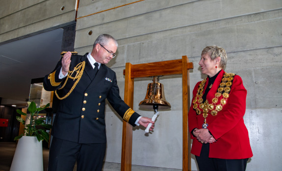 Chief of Navy, Rear Admiral David Proctor presented the bell to Christchurch Mayor, Lianne Dalziel at the city council offices.