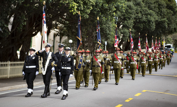 NZDF personnel parade Her Majesty The Queen’s flag for New Zealand for final time