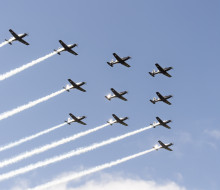 Eleven ship formation of the Air Force's Texan aircraft on a nice day blue sky day. 
