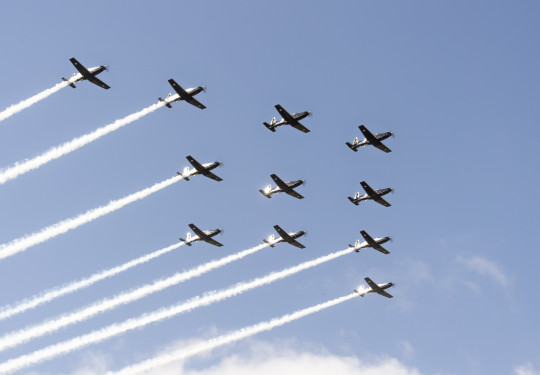 Eleven ship formation of the Air Force's Texan aircraft on a nice day blue sky day. 