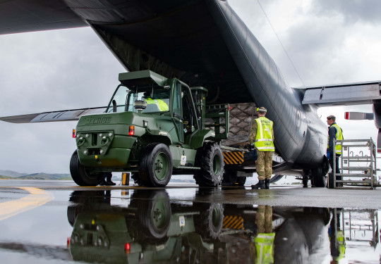 RNZAF Hercules aircraft at Napier airport loading supplies and generators for Gisborne.