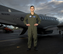 Flight Lieutenant Tyler Ngapo standing infront of the King Air aircraft
