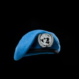 UN Beret on black background