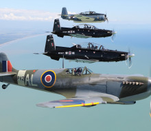 Past and present: Air Force Heritage Flight aircraft the Spitfire (bottom of photo) and Avenger (top) flying in formation with Texans from the Central Flying School at Ohakea