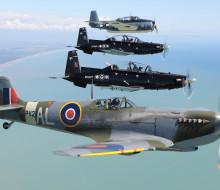 Past and present: Air Force Heritage Flight aircraft the Spitfire (bottom of photo) and Avenger (top) flying in formation with Texans from the Central Flying School at Ohakea