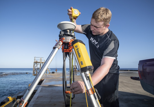 Able Hydrographic Systems Operator Joshua Phillips is a world away from mid-winter Milton as he carrying out surveying work in the tropical heat of Niue with the New Zealand Defence Force