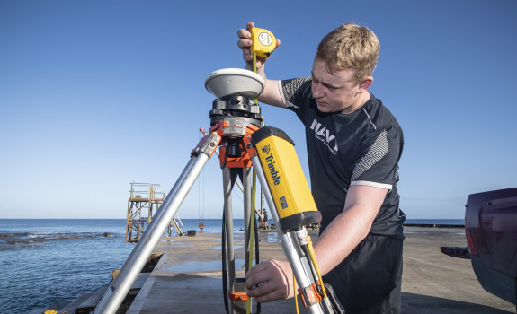 Able Hydrographic Systems Operator Joshua Phillips is a world away from mid-winter Milton as he carrying out surveying work in the tropical heat of Niue with the New Zealand Defence Force