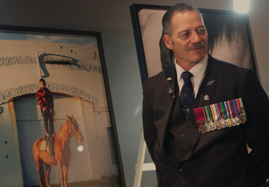Former New Zealand Army Special Air Service soldier and Victoria Cross recipient, Willie Apiata, with auction items at his fundraiser for Ngāti Porou in Auckland