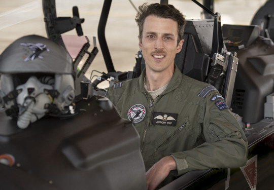 Squadron Anthony Leader Rose sitting inside the cockpit of a Texan aircraft