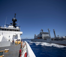 HMNZS Aotearoa conducts replenishment at sea with US Coast Guard Cutter Midgett.