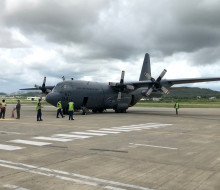 The Royal New Zealand Air Force C-130 Hercules arrives in Port Moresby.