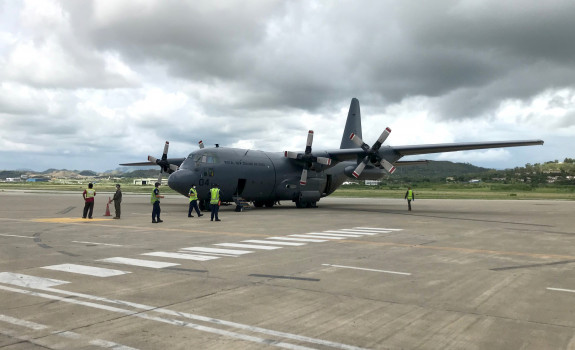 The Royal New Zealand Air Force C-130 Hercules arrives in Port Moresby.
