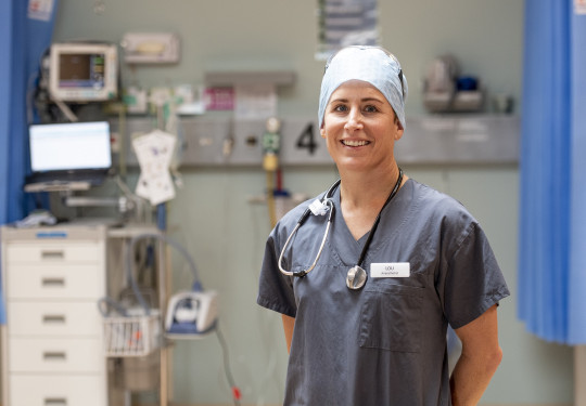 Major Louise Speed wearing scrubs in Whanganui Hospital.