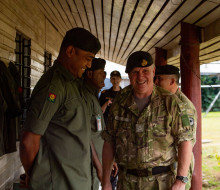 Major General John Boswell receiving a tour of Delta Company in Nadi
