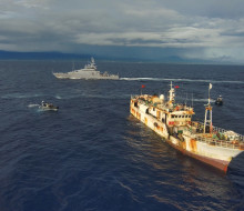 Two Rigid Hulled Inflatable Boats from HMNZS Taupo approach a vessel prior to boarding