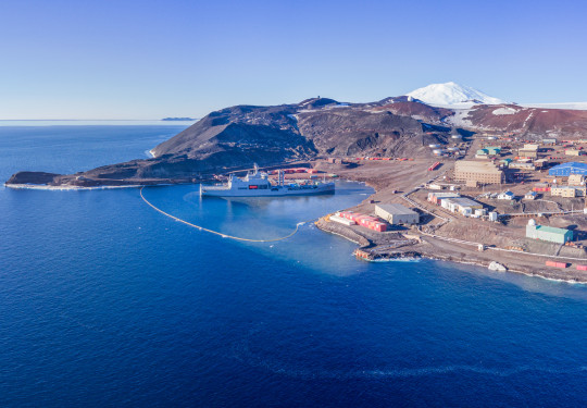 HMNZS Aotearoa and crew have berthed at Antarctica, delivering supplies and providing key support. Credit: Antarctica New Zealand