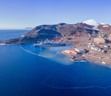 HMNZS Aotearoa and crew have berthed at Antarctica, delivering supplies and providing key support. Credit: Antarctica New Zealand