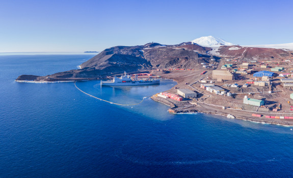 HMNZS Aotearoa and crew have berthed at Antarctica, delivering supplies and providing key support. Credit: Antarctica New Zealand