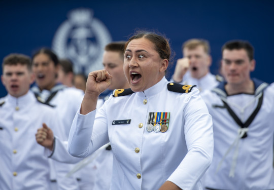 Sub Lieutenant Tyler Simeon performs a haka alongside other graduates