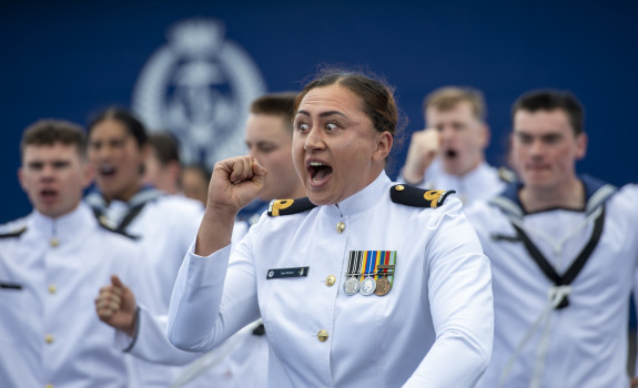 Sub Lieutenant Tyler Simeon performs a haka alongside other graduates