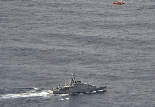 HMNZS Taupo and a Westpac Rescue helicopter during the search off North Cape for those missing from fishing charter vessel Enchanter. Photo taken by Orion crew involved in the search.