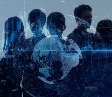 Graphic of five silhouettes of people that is a mix of light and dark blue. In the background, there is a city and over top of the people a globe and numbers. The image represents 'intelligence'