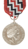 The Queen’s Service Medal (QSM)