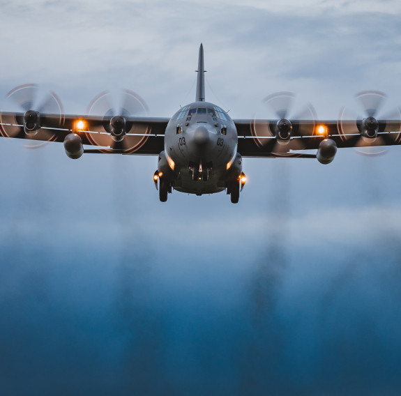 A Royal New Zealand Air Force Hercules aircraft lands in the UK ready to soon begin transporting donated military aid between centres in Europe. Credit: RAF