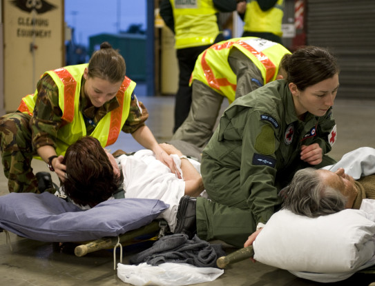 Air Force, Army and Navy personnel, including Medics, Air Crew, Force Protection and Logistics Specialists, perform an aero-medical evacuation for Christchurch rest home residents affected by the Canterbury Earthquake