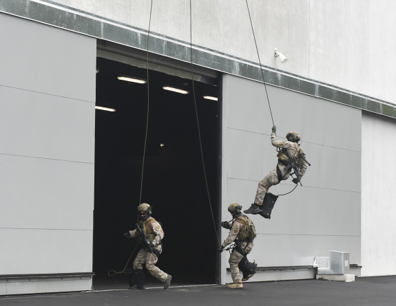 Personnel rappel into the new battle training facility.
