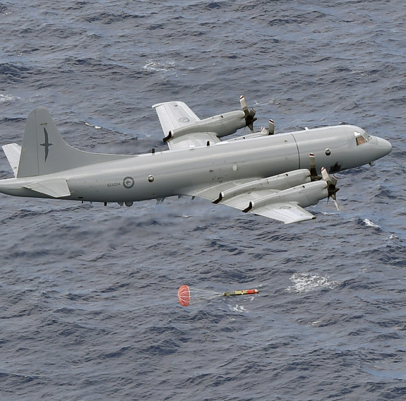 P-3K2 low level live firing of MK46 Torpedo over the sea.