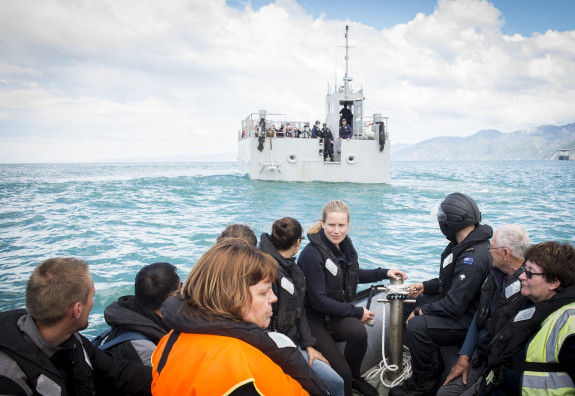 Travellers and locals from Kaikoura on a landing craft mechanism to HMNZS Canterbury as part of the evacuations following a magnitude 7.5 Earthquake