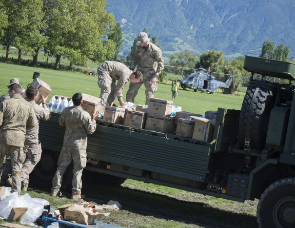 Personnel unload aid supplies from a truck in Kaikoura following a magnitude 7.5 Earthquake.