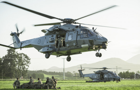 Two NH90 helicopters of the Royal New Zealand Air Force touch down and release New Zealand Army soldiers to secure an area in the town of Ward, as part of the exercise Southern Katipo.