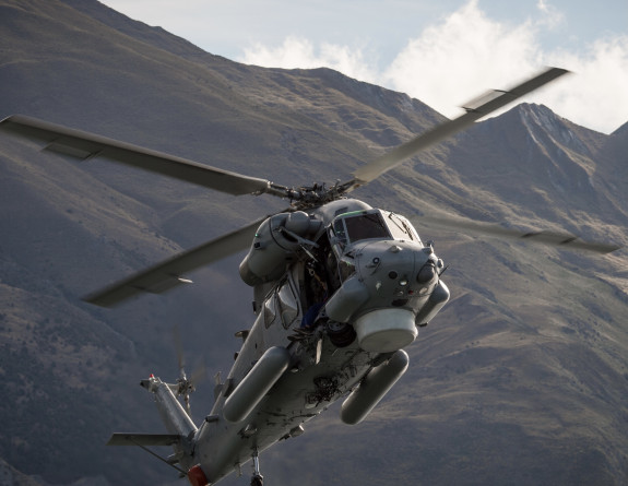 SH-2G(I) Seasprite Helicopter and aircrew showing it's capability in an air display at Warbirds over Wanaka 2018