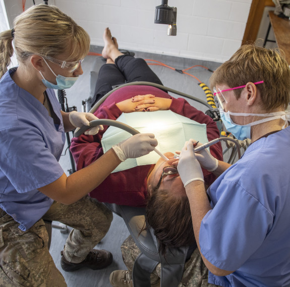 Army dentists provide a free service to patients from the Tuhoe tribe in the town of Taneatua, near Whakatane.