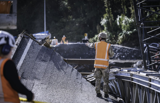 Combat Engineers from Burnham and Linton assist Downer Construction in rebuilding the MSR bridge that leads to Fox Glacier from the town centre.