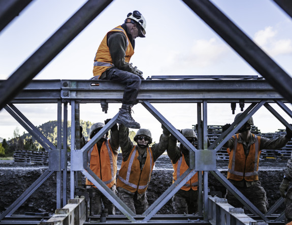 Combat Engineers from Burnham and Linton assist Downer Construction in rebuilding the MSR bridge that leads to Fox Glacier from the town centre.