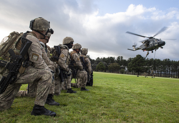 NZ Army soldiers from 1st Battlion practice fast-roping from the fast-roping tower and out of 3SQN NH90 helicopters at Linton Military Camp.