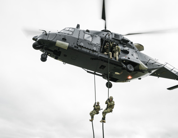 2/1 RNZIR soldiers qualify from fast roping from a NH90 helicopter over a paddock at Burnham Military Camp 