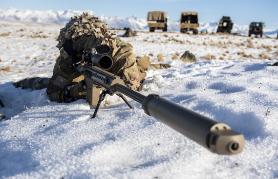A member of the Fire Support Group aims with the anti-materiel rifle in the snow in the Tekapo Military Training Area.